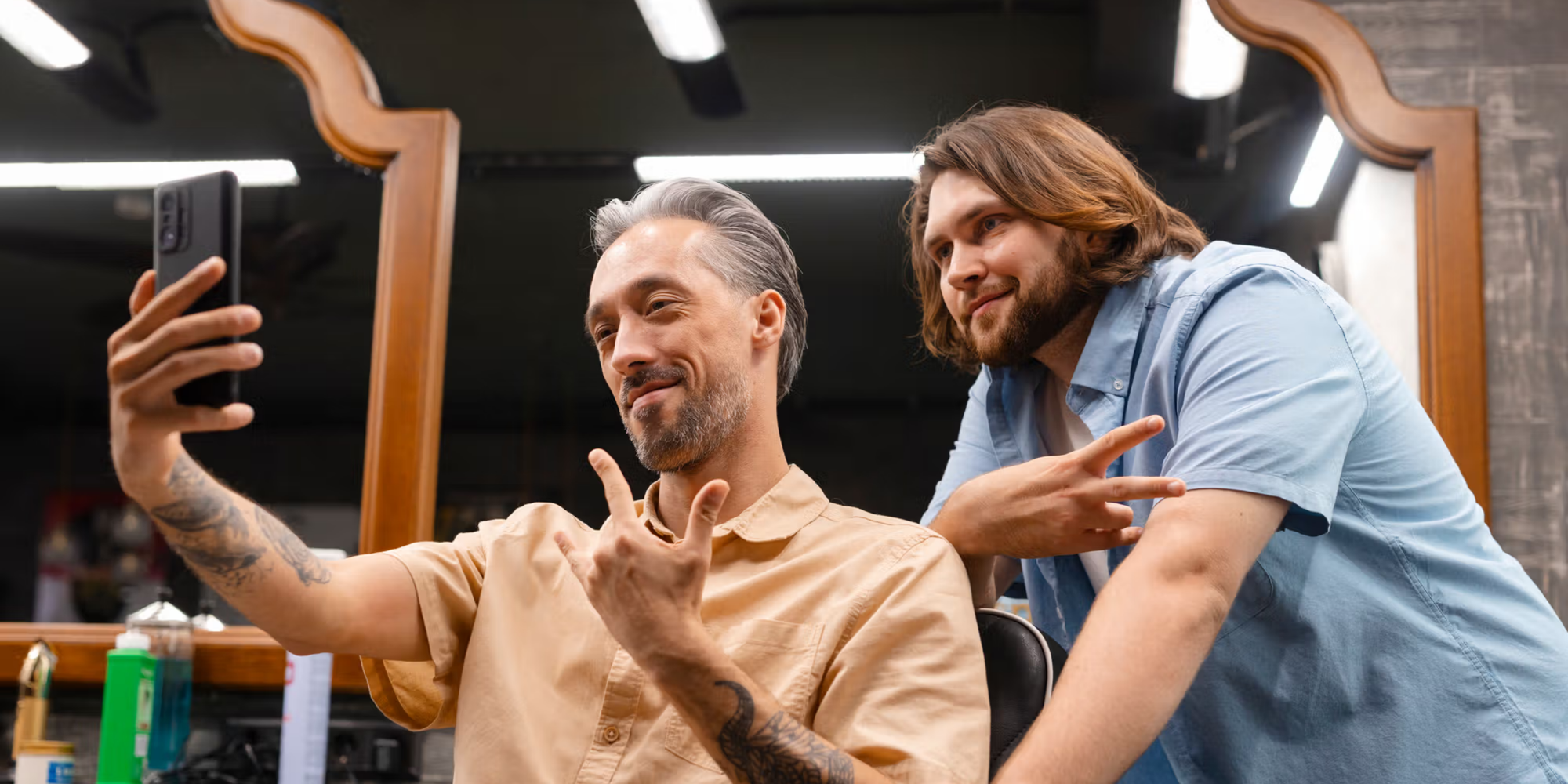 man taking picture on barber chair to make barber advertising