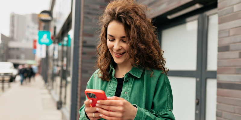 Woman setting up SMS reminders for Google Calendar